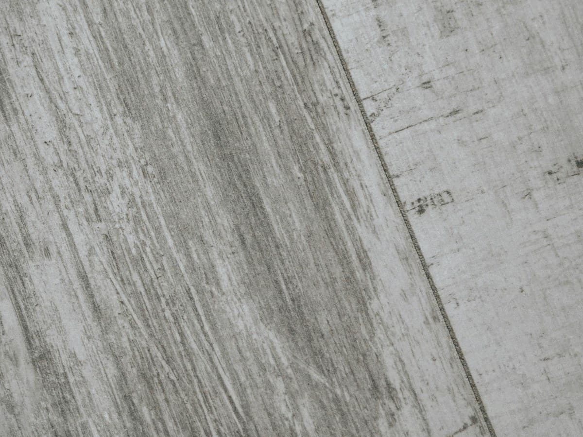 Luxury vinyl tile flooring — soft grey tones